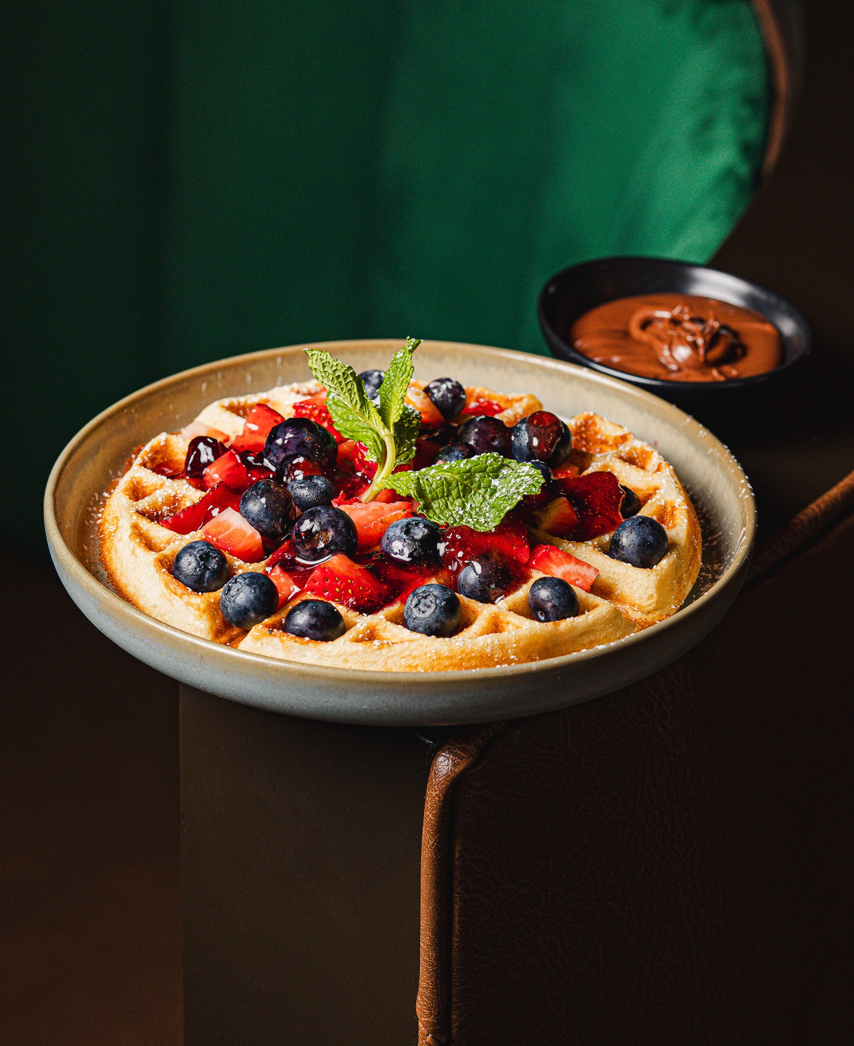 Fine dining breakfast presentation with pastries and tropical fruits