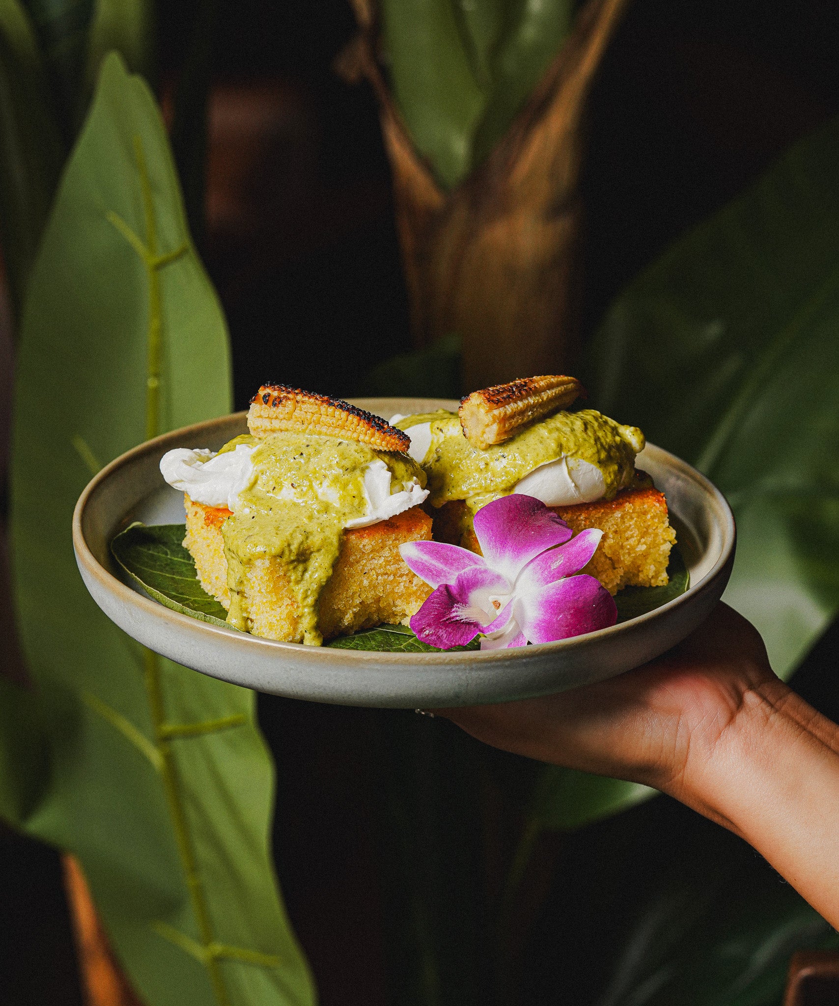 Pastel-themed flat lay featuring Casa Matilda’s signature dishes