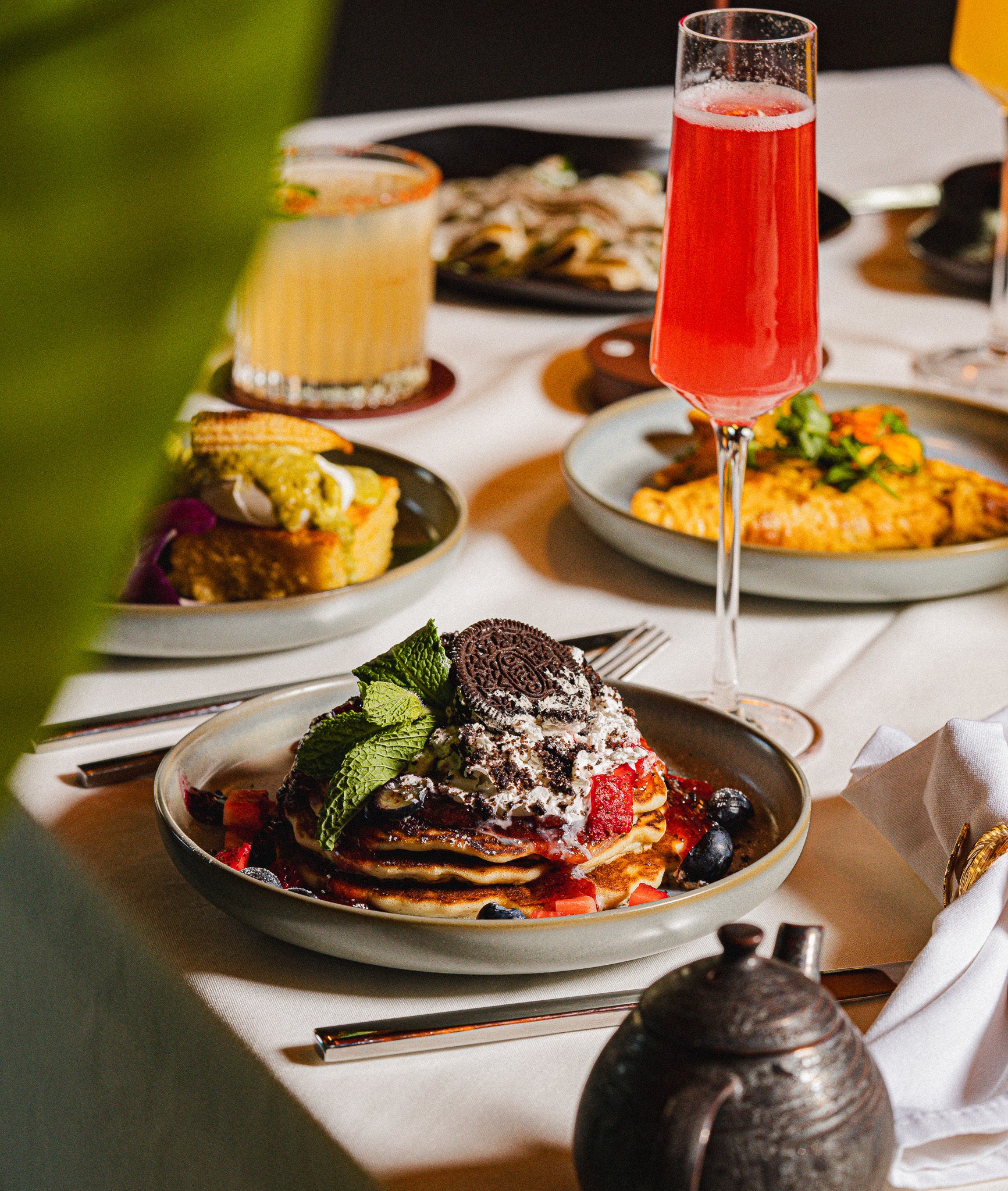 Soft-focus image of sophisticated brunch plating with minimalist design